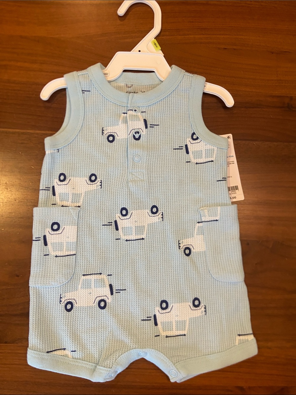 Carter’s Baby Blue Waffle Knit Romper with Truck Print
